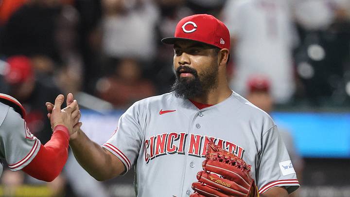 May 26, 2026; New York City, New York, USA;  Cincinnati Reds relief pitcher Tony Santillan (64) and catcher Tyler Stephenson (37) celebrate after defeating the New York Mets 7-2 at Citi Field. Mandatory Credit: Wendell Cruz-Imagn Images