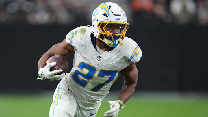 Jan 5, 2025; Paradise, Nevada, USA; Los Angeles Chargers running back J.K. Dobbins (27) carries the ball against the Las Vegas Raiders in the second half at Allegiant Stadium. Mandatory Credit: Kirby Lee-Imagn Images Jan 5, 2025; Paradise, Nevada, USA; Los Angeles Chargers running back J.K. Dobbins (27) carries the ball against the Las Vegas Raiders in the second half at Allegiant Stadium. Mandatory Credit: Kirby Lee-Imagn Images