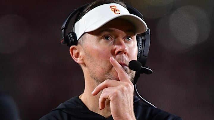 Nov 7, 2025; Los Angeles, California, USA; Southern California Trojans head coach Lincoln Riley watches game action against the Northwestern Wildcats during the second half at the Los Angeles Memorial Coliseum. Mandatory Credit: Gary A. Vasquez-Imagn Images Nov 7, 2025; Los Angeles, California, USA; Southern California Trojans head coach Lincoln Riley watches game action against the Northwestern Wildcats during the second half at the Los Angeles Memorial Coliseum. Mandatory Credit: Gary A. Vasquez-Imagn Images