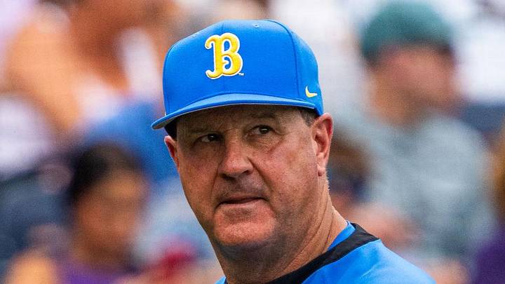 Jun 16, 2025; Omaha, Neb, USA; UCLA Bruins head coach John Savage walks off the field before the game against the LSU Tigers at Charles Schwab Field. Mandatory Credit: Dylan Widger-Imagn Images Jun 16, 2025; Omaha, Neb, USA; UCLA Bruins head coach John Savage walks off the field before the game against the LSU Tigers at Charles Schwab Field. Mandatory Credit: Dylan Widger-Imagn Images