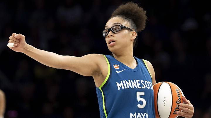 May 21, 2026; Minneapolis, Minnesota, USA; Minnesota Lynx guard Olivia Miles (5) holds her arm out as a transition foul is called against the Toronto Tempo in the second half at Target Center. Mandatory Credit: Jesse Johnson-Imagn Images