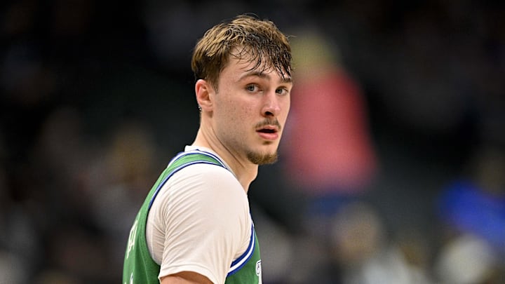 Apr 3, 2026; Dallas, Texas, USA; Dallas Mavericks forward Cooper Flagg (32) looks back as he reenters the game against the Orlando Magic during the fourth quarter at the American Airlines Center. Mandatory Credit: Jerome Miron-Imagn Images