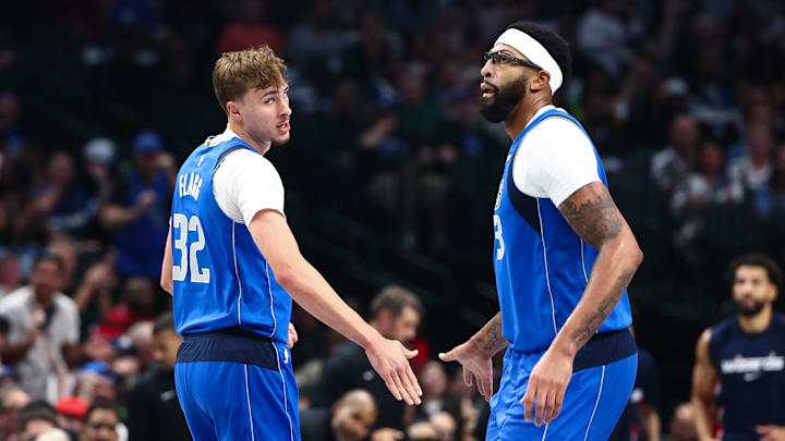 Oct 24, 2025; Dallas, Texas, USA;  Dallas Mavericks forward Cooper Flagg (32) celebrates with Dallas Mavericks forward Anthony Davis (3) during the first quarter against the Washington Wizards at American Airlines Center. Mandatory Credit: Kevin Jairaj-Imagn Images