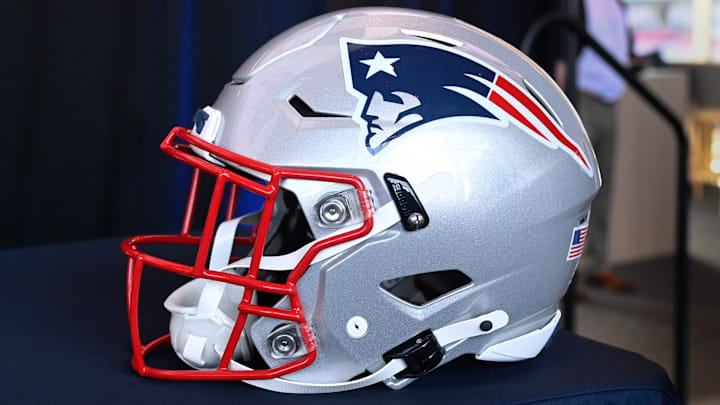 Jan 17, 2024; Foxborough, MA, USA; A New England Patriots helmet sits on a table prior to a press conference at Gillette Stadium. Mandatory Credit: Eric Canha-Imagn Images