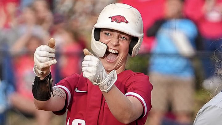 Arkansas Razorbacks Kailey Wyckoff gives a thumbs-up to the dugout against the Kentucky Wildcats at Bogle Park in Fayetteville, Ark