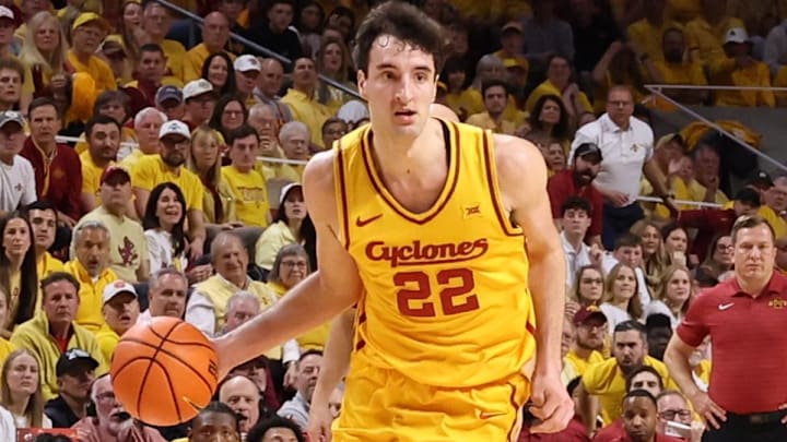 Feb 16, 2026; Ames, Iowa, USA;  Iowa State Cyclones forward Milan Momcilovic (22) sets the offense against the Houston Cougars during the first half at James H. Hilton Coliseum.