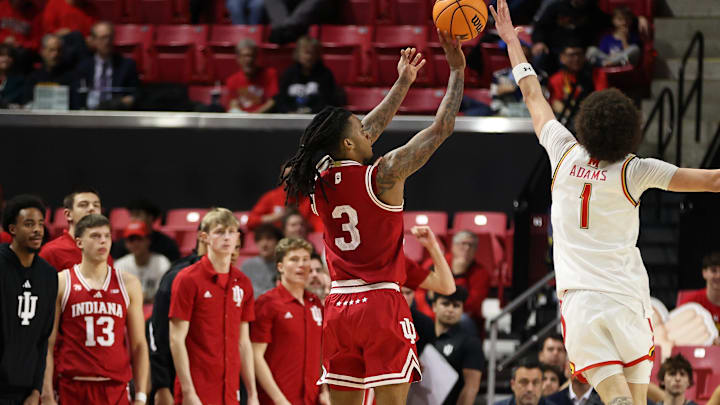 Jan 7, 2026; College Park, Maryland, USA; Indiana Hoosiers guard Lamar Wilkerson (3) takes a shot over Maryland Terrapins guard Darius Adams (1) during the second half at Xfinity Center.