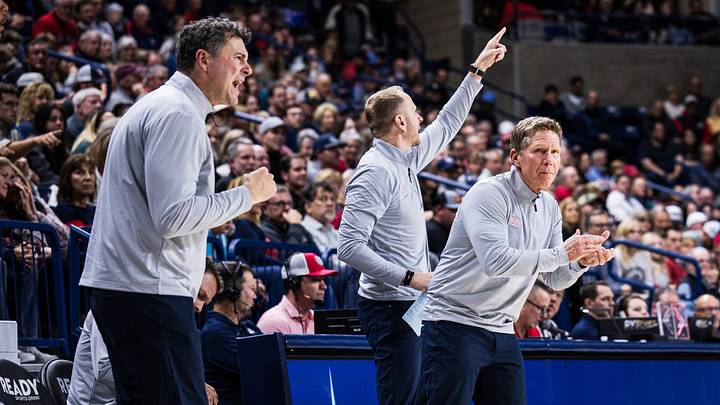 Gonzaga Bulldogs assistant coaches Brian Michaelson (left), Stephen Gentry (middle) and head coach Mark Few (right). Gonzaga Bulldogs assistant coaches Brian Michaelson (left), Stephen Gentry (middle) and head coach Mark Few (right).