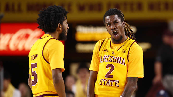 Feb 28, 2026; Tempe, Arizona, USA; Arizona State Sun Devils guard Anthony Johnson (2) celebrates with guard Maurice Odum (5) against the Utah Utes in the second half at Desert Financial Arena. Mandatory Credit: Mark J. Rebilas-Imagn Images