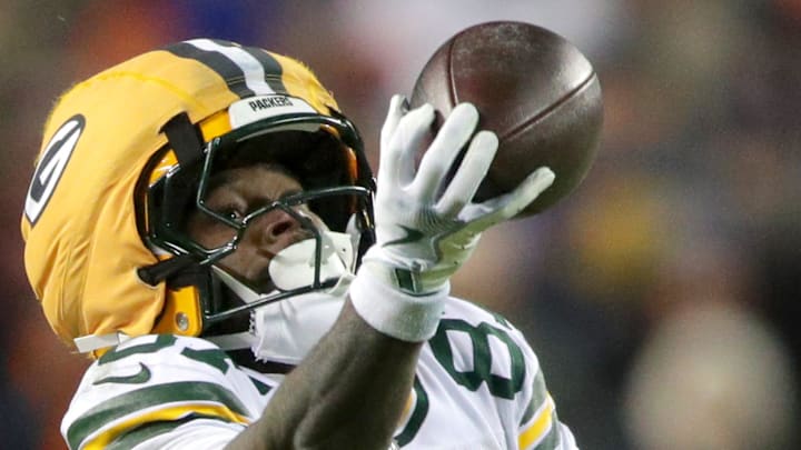 Green Bay Packers receiver Romeo Doubs makes a one-handed catch late in the playoff game against Chicago.