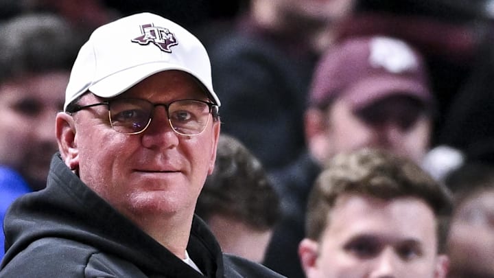 Texas A&M Aggies head football coach Mike Elko sits court side during the Men’s basketball game against the Florida Gators at Reed Arena.