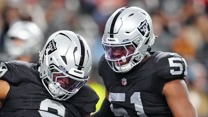 Jan 4, 2026; Paradise, Nevada, USA; Las Vegas Raiders defensive end Tyree Wilson (9) celebrates with Las Vegas Raiders defensive end Malcolm Koonce (51) after sacking Kansas City Chiefs quarterback Chris Oladokun (19) for a safety during the fourth quarter at Allegiant Stadium. Mandatory Credit: Stephen R. Sylvanie-Imagn Images