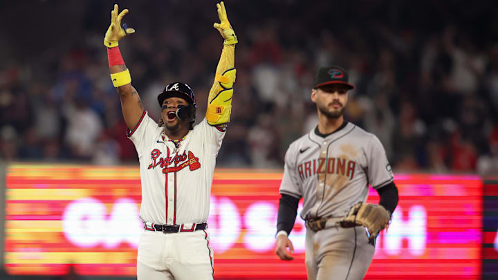 Apr 6, 2024; Atlanta, Georgia, USA; Atlanta Braves right fielder Ronald Acuna Jr. (13) celebrates after hitting a game-tying single in the 8th inning. Apr 6, 2024; Atlanta, Georgia, USA; Atlanta Braves right fielder Ronald Acuna Jr. (13) celebrates after hitting a game-tying single in the 8th inning.