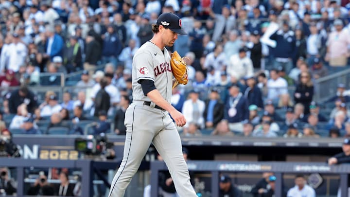 Oct 14, 2022; Bronx, New York, USA; Cleveland Guardians starting pitcher Shane Bieber (57) walks back to the dugout after being taken out of the game against the New York Yankees during the sixth inning in game two of the ALDS for the 2022 MLB Playoffs at Yankee Stadium. Mandatory Credit: Vincent Carchietta-Imagn Images