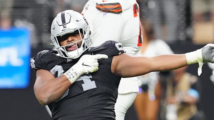 Sep 29, 2024; Paradise, Nevada, USA; Las Vegas Raiders defensive tackle Christian Wilkins (94) celebrates after a penalty overturned a scoring play by the Cleveland Browns during the fourth quarter at Allegiant Stadium. Mandatory Credit: Stephen R. Sylvanie-Imagn Images Sep 29, 2024; Paradise, Nevada, USA; Las Vegas Raiders defensive tackle Christian Wilkins (94) celebrates after a penalty overturned a scoring play by the Cleveland Browns during the fourth quarter at Allegiant Stadium. Mandatory Credit: Stephen R. Sylvanie-Imagn Images