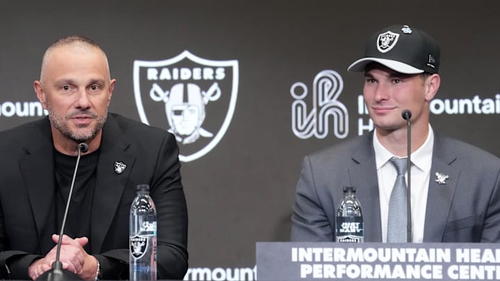 Las Vegas Raiders quarterback Fernando Mendoza (right) and general manager John Spytek (left) at introductory press conference.