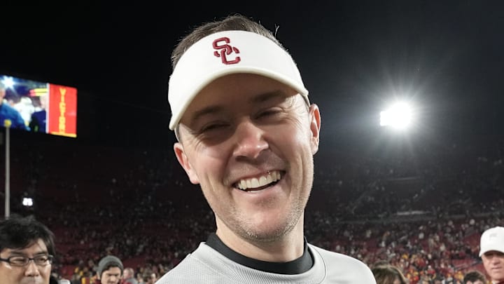 Nov 26, 2022; Los Angeles, California, USA; Southern California Trojans head coach Lincoln Riley celebrates after the game against the Notre Dame Fighting Irish at United Airlines Field at Los Angeles Memorial Coliseum. Mandatory Credit: Kirby Lee-Imagn Images