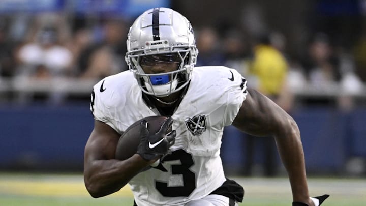 Oct 20, 2024; Inglewood, California, USA; Las Vegas Raiders running back Zamir White (3) runs after a catch against the Los Angeles Rams during the second half at SoFi Stadium. Mandatory Credit: Alex Gallardo-Imagn Images