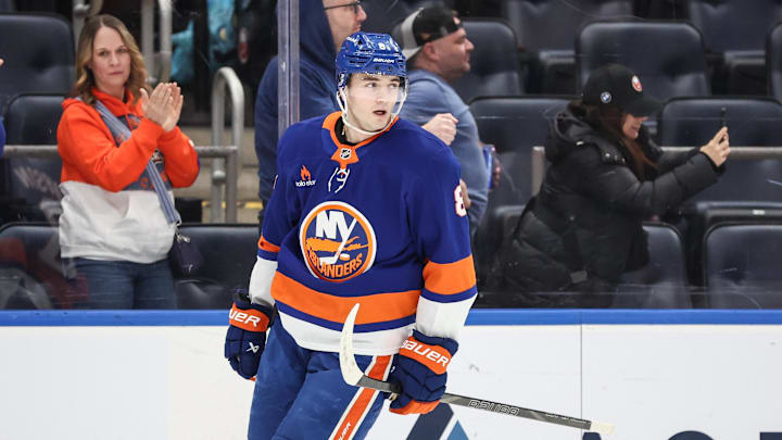 Apr 4, 2025; Elmont, New York, USA;  New York Islanders defenseman Noah Dobson (8) circles back to center ice after scoring a goal in the third period against the Minnesota Wild at UBS Arena. Mandatory Credit: Wendell Cruz-Imagn Images