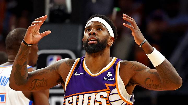 Phoenix, Arizona, USA; Phoenix Suns forward Royce O'Neale (00) reacts during the third quarter of the game against the Oklahoma City Thunder at Footprint Center on Mar 3, 2024. Phoenix, Arizona, USA; Phoenix Suns forward Royce O'Neale (00) reacts during the third quarter of the game against the Oklahoma City Thunder at Footprint Center on Mar 3, 2024.