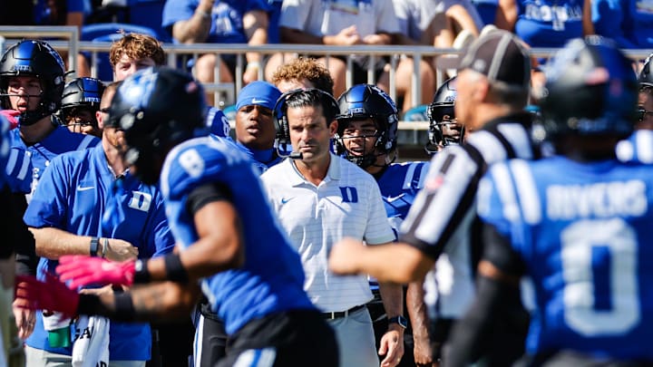 Oct 18, 2025; Durham, North Carolina, USA; Duke Blue Devils head coach Manny Diaz looks on during the first half of the game against Georgia Tech Yellow Jackets at Wallace Wade Stadium. Mandatory Credit: Jaylynn Nash-Imagn Images Oct 18, 2025; Durham, North Carolina, USA; Duke Blue Devils head coach Manny Diaz looks on during the first half of the game against Georgia Tech Yellow Jackets at Wallace Wade Stadium. Mandatory Credit: Jaylynn Nash-Imagn Images