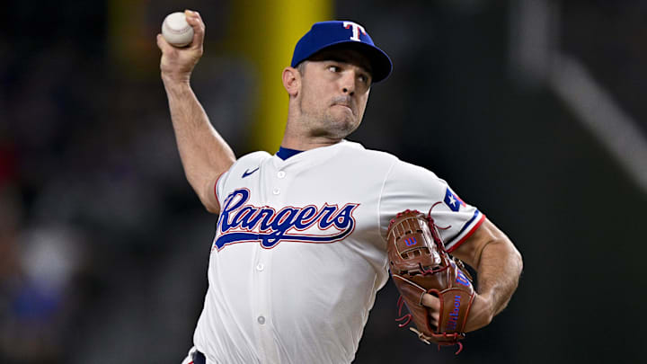Aug 3, 2024; Arlington, Texas, USA;  Texas Rangers relief pitcher David Robertson (37) pitches against the Boston Red Sox during the seventh inning at Globe Life Field