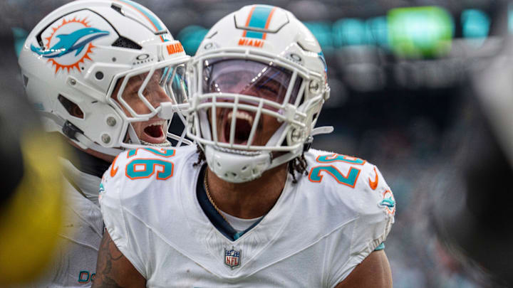 Miami Dolphins defensive back Rasul Douglas (26) celebrates after intercepting a pass during a week 14 football game between the New York Jets and Miami Dolphins at MetLife Stadium on Sunday, Dec. 7, 2025.