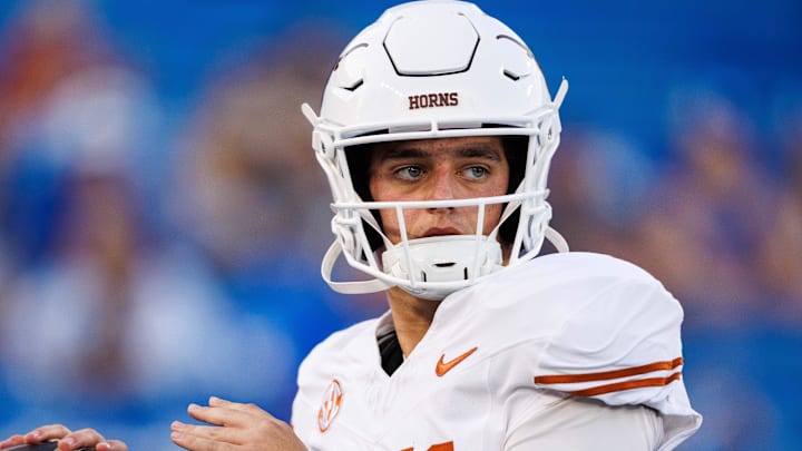Texas Longhorns quarterback Arch Manning warms up before the game against the Kentucky Wildcats at Kroger Field. Texas Longhorns quarterback Arch Manning warms up before the game against the Kentucky Wildcats at Kroger Field.