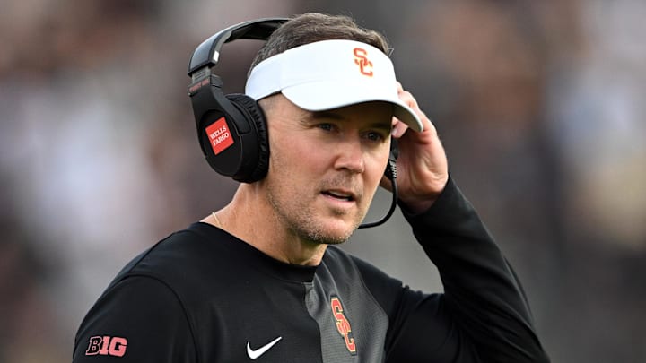 Sep 13, 2025; West Lafayette, Indiana, USA; Southern California Trojans head coach Lincoln Riley stands on the sidelines during the first quarter against the Purdue Boilermakers at Ross-Ade Stadium. Mandatory Credit: Marc Lebryk-Imagn Images Sep 13, 2025; West Lafayette, Indiana, USA; Southern California Trojans head coach Lincoln Riley stands on the sidelines during the first quarter against the Purdue Boilermakers at Ross-Ade Stadium. Mandatory Credit: Marc Lebryk-Imagn Images
