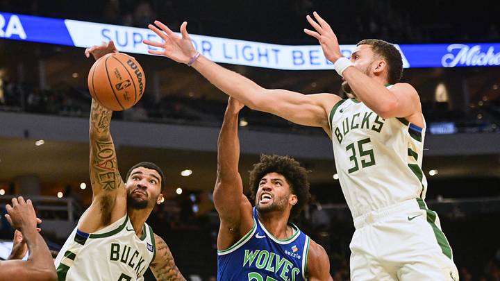 Oct 5, 2026; Milwaukee, Wisconsin, USA; Milwaukee Bucks center Kel'el Ware (9) and forward Pete Nance (35) battle for a rebound against Minnesota Timberwolves forward Norchad Omier (23) and guard Antonio Reeves (12) in the fourth quarter at Fiserv Forum. Mandatory Credit: Benny Sieu-Imagn Images Oct 5, 2026; Milwaukee, Wisconsin, USA; Milwaukee Bucks center Kel'el Ware (9) and forward Pete Nance (35) battle for a rebound against Minnesota Timberwolves forward Norchad Omier (23) and guard Antonio Reeves (12) in the fourth quarter at Fiserv Forum. Mandatory Credit: Benny Sieu-Imagn Images