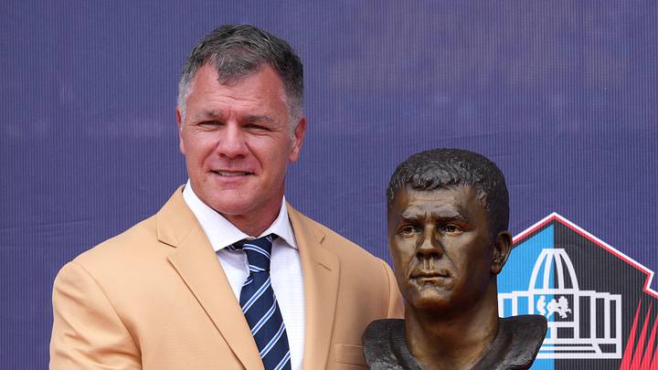  Pro Football Hall of Fame enshrinee Adam Vinatieri poses with his bust during the Class of 2026 enshrinement ceremony