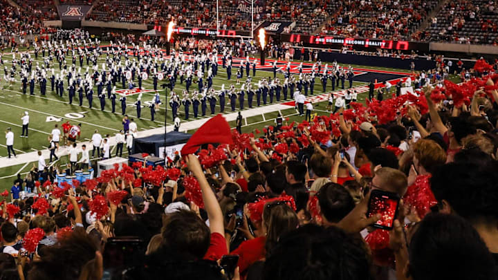 Aug 30, 2025; Tucson, Arizona, USA; Arizona Wildcats team runs out before the start of the Hawaii Rainbow Warriors at Arizona Stadium. Mandatory Credit: Aryanna Frank-Imagn Images Aug 30, 2025; Tucson, Arizona, USA; Arizona Wildcats team runs out before the start of the Hawaii Rainbow Warriors at Arizona Stadium. Mandatory Credit: Aryanna Frank-Imagn Images