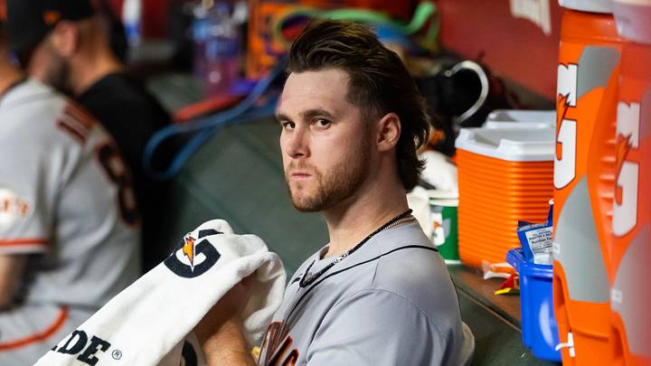 Phoenix, Arizona, USA; San Francisco Giants pitcher Landen Roupp reacts in the dugout after being pulled from the game in the third inning against the Arizona Diamondbacks at Chase Field. Mandatory Credit: Mark J. Rebilas-Imagn Images