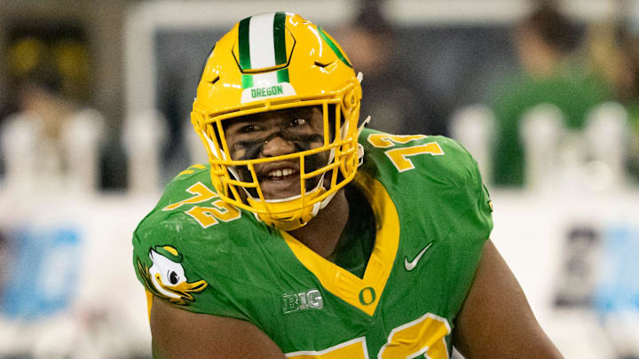 Oregon offensive lineman Iapani Laloulu prepares to snap the ball as the Oregon Ducks host the Maryland Terrapins at Autzen Stadium Saturday, Nov. 9, 2024 in Eugene, Ore. Oregon offensive lineman Iapani Laloulu prepares to snap the ball as the Oregon Ducks host the Maryland Terrapins at Autzen Stadium Saturday, Nov. 9, 2024 in Eugene, Ore.