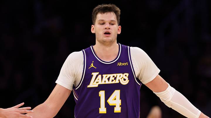 Oct 23, 2026; Los Angeles, California, USA;  Los Angeles Lakers center Walker Kessler (14) is greeted by guard Austin Reaves (15) during the fourth quarter against the Los Angeles Clippers at Crypto.com Arena. Mandatory Credit: Kiyoshi Mio-Imagn Images