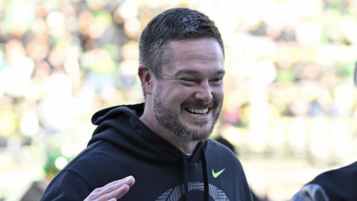 Nov 22, 2025; Eugene, Oregon, USA; Oregon Ducks head coach Dan Lanning smiles before the game against the Southern California Trojans at Autzen Stadium. Mandatory Credit: Troy Wayrynen-Imagn Images Nov 22, 2025; Eugene, Oregon, USA; Oregon Ducks head coach Dan Lanning smiles before the game against the Southern California Trojans at Autzen Stadium. Mandatory Credit: Troy Wayrynen-Imagn Images