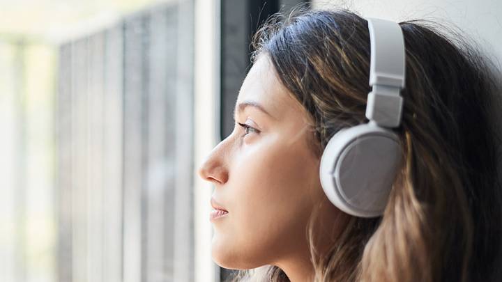 Sad woman listening to music