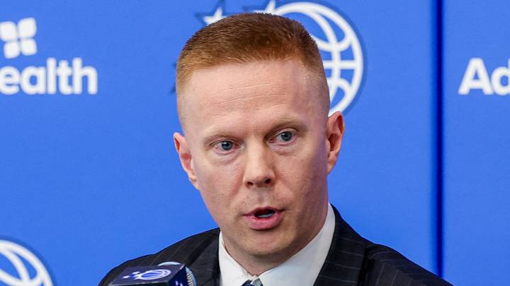 Orlando Magic head coach Sean Sweeney takes media questions during a press conference.