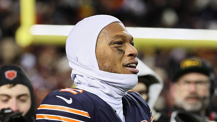 Dec 20, 2025; Chicago, Illinois, USA; Chicago Bears wide receiver DJ Moore (2) reacts after catching the game-winning forty-six yard touchdown pass thrown by quarterback Caleb Williams (not pictured) in overtime against the Green Bay Packers at Soldier Field. Mandatory Credit: Mike Dinovo-Imagn Images