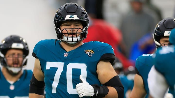 Jacksonville Jaguars offensive tackle Cole Van Lanen (70) runs on the field before an NFL football matchup Sunday, Dec. 29, 2024 at EverBank Stadium in Jacksonville, Fla. The Jaguars held off the Titans 20-13. [Corey Perrine/Florida Times-Union]