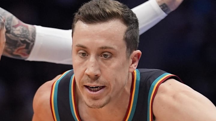 Apr 10, 2026; Charlotte, North Carolina, USA;  Detroit Pistons forward Duncan Robinson (55) goes to the basket against Charlotte Hornets guard LaMelo Ball (1) during first quarter at Spectrum Center. Mandatory Credit: Jim Dedmon-Imagn Images