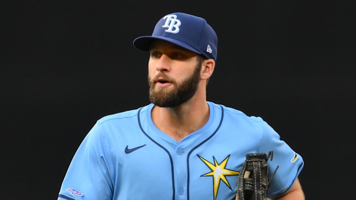 Tampa Bay Rays center fielder Tristan Peters (25) jogs off the field against the Seattle Mariners at T-Mobile Park. Tampa Bay Rays center fielder Tristan Peters (25) jogs off the field against the Seattle Mariners at T-Mobile Park.