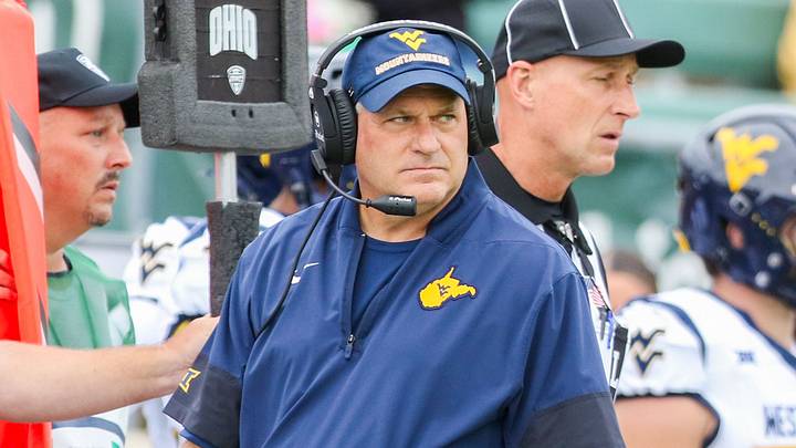 Sep 6, 2025; Athens, Ohio, USA; West Virginia Mountaineers head coach Rich Rodriguez walks along the sidelines during the first quarter against the Ohio Bobcats at Peden Stadium. Mandatory Credit: Ben Queen-Imagn Images Sep 6, 2025; Athens, Ohio, USA; West Virginia Mountaineers head coach Rich Rodriguez walks along the sidelines during the first quarter against the Ohio Bobcats at Peden Stadium. Mandatory Credit: Ben Queen-Imagn Images