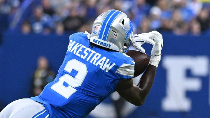 Aug 29, 2026; Indianapolis, Indiana, USA;  Detroit Lions cornerback Ennis Rakestraw Jr. (2) leaps for the ball against Indianapolis Colts wide receiver Anthony Gould (6) during the first half at Lucas Oil Stadium.  Mandatory Credit: Robert Goddin-Imagn Images