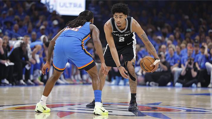 May 18, 2026; Oklahoma City, Oklahoma, USA; San Antonio Spurs guard Dylan Harper (2) controls the ball while defended by Oklahoma City Thunder guard Cason Wallace (22) in the second quarter during Game 1 of the Western Conference Finals for the 2026 NBA Playoffs at Paycom Center. May 18, 2026; Oklahoma City, Oklahoma, USA; San Antonio Spurs guard Dylan Harper (2) controls the ball while defended by Oklahoma City Thunder guard Cason Wallace (22) in the second quarter during Game 1 of the Western Conference Finals for the 2026 NBA Playoffs at Paycom Center.