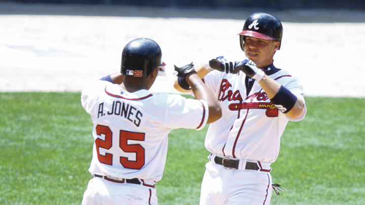 2002, Atlanta, GA, USA; FILE PHOTO; Atlanta Braves outfielder Andruw Jones celebrates with third baseman Chipper Jones at Turner Field during the 2002 season. Mandatory Credit: RVR Photos-Imagn Images 2002, Atlanta, GA, USA; FILE PHOTO; Atlanta Braves outfielder Andruw Jones celebrates with third baseman Chipper Jones at Turner Field during the 2002 season. Mandatory Credit: RVR Photos-Imagn Images