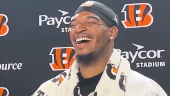 Cincinnati Bengals WR Ja'Marr Chase was loving a reporter's choice of shirt during training camp. 