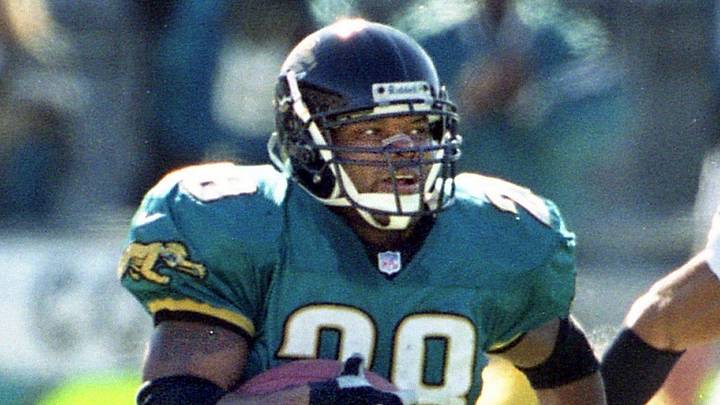 Brock Marion (31) tries to chase down former Jaguars running back Fred Taylor in a 2000 AFC playoff game at TIAA Bank Field. Marion, who played with Dallas, Miami and Detroit, will be part of the Jaguars coaching staff for training camp.