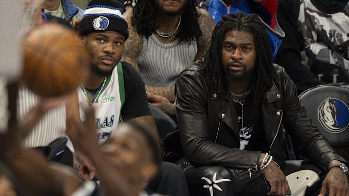 Dallas Cowboys stars Micah Parsons and Trevon Diggs watch an NBA game between the Dallas Mavericks and Minnesota Timberwolves 