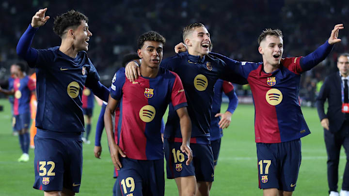 La Masia talents (from left to right) Héctor Fort, Lamine Yamal, Fermín López and Masc Casadó celebrate Barcelona's 4-1 victory over Bayern Munich in the UEFA Champions League.